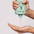 Kerastase Specifique Bain Divalent Balancing Shampoo product in hand